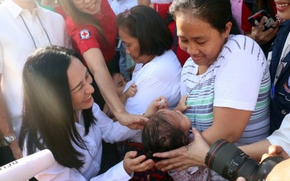 <p><strong>POLIO IMMUNIZATION.</strong> A child is being immunized with antipolio vaccine. The province of Davao Oriental has scheduled two rounds of provincewide mass polio immunization, the first of which will be on November 25 to December 6, 2019. <em>(PNA file photo)</em></p>