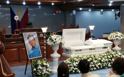<p>Senators, government officials, and Senate employees pay tribute to former Senate President Aquilino “Nene” Pimentel Jr. in necrological rites at the Session Hall on Wednesday (Oct. 23). Pimentel, 85, succumbed to lymphoma on Sunday. <em>(PNA photo by Avito Dalan)</em></p>