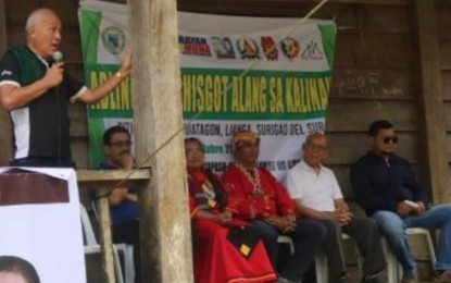 <p><strong>SUPPORT TO EO 70.</strong> Surigao del Sur Governor Alexander Pimentel speaks during a community dialogue in Diatagon, Lianga town on Monday (Oct. 21, 2019). The mayor reiterated the provincial government's support to the aspirations of the Duterte administration to end local communist insurgency and realize genuine peace and development in the area. <em>(Photo courtesy of CMO, 3SFBn)</em></p>