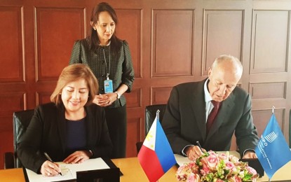 <p><strong>INTELLECTUAL PROPERTY.</strong> Intellectual Property Office of the Philippines Director General Josephine Santiago (left) and World Intellectual Property Organization Director General Francis Gurry sign a memorandum of understanding on enhancing intellectual property and technology support, at the margins of the WIPO General Assemblies in Geneva on Oct. 7, 2019. Deputy Permanent Representative and Chargé d’Affaires Maria Teresa Almojuela witnessed the signing of MOU. <em>(Photo courtesy of Philippine Mission to the United Nations in Geneva)</em></p>