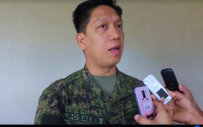 <p>ARRESTED. Lt. Col. Rhodjun Rosales, the Army’s 39th Infantry Battalion commander, speaks to local journalists following the arrest of Mindaley Satentes-Genotiva, the alleged New People’s Army urban organizing committee chairperson in Central Mindanao, at a checkpoint in Kidapawan City on Wednesday (Oct. 23, 2019). The Army official said Genotiva has standing warrants of arrest for frustrated murder and extortion. <em>(Photo courtesy of 39th IB)</em></p>