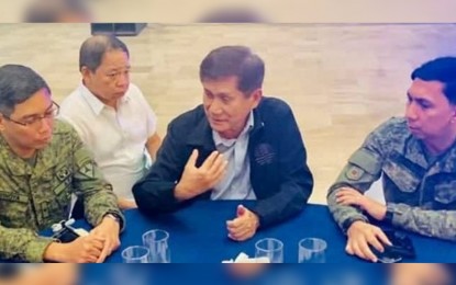 <p><strong>ANTI-INSURGENCY MEETING.</strong> Environment Secretary Roy Cimatu (center), also the Cabinet Officer for Regional Development and Security of Western Visayas, meets with Brig. Gen. Eric Vinoya (left), commander of Joint Task Force-Negros, and Brig. Gen. Benedict Arevalo, commander of 303rd Infantry Brigade, on the sidelines of the Regional Task Force to End Local Communist Armed Conflict meeting in Bacolod City on Tuesday (Oct. 22, 2019). Arevalo said local government units can lead the delivery of services to priority villages, with the support of security forces, to prevent residents from being recruited by the communist group. <em>(Photo courtesy of 303rd Infantry Brigade)Photo courtesy of 303<sup>rd</sup> Infantry Brigade, Philippine Army</em></p>
<p><em> </em></p>