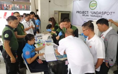 <p><strong>SURPRISE DRUG TEST.</strong> Bus drivers undergo a surprise drug test at bus terminals in the cities of Pasay and Quezon on Monday (Oct. 28, 2019). The Oplan "Undaspot" aims to ensure the safety of passengers, especially those who are going to the provinces to observe All Saints' Day and All Souls' Day. <em>(Photo courtesy of PDEA)</em></p>