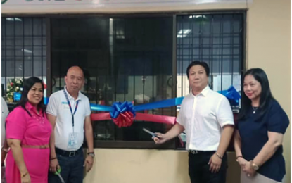 <p><strong>E-BPLS IN CAVITE</strong>. Noveleta, Cavite Mayor Dino Reyes Chua (2nd from right) together with Department of Information and Communications Technology (DICT) assistant regional director Antonio Padre (2nd from left), Herseline Molina, BPLO head (left); and Municipal Treasurer Ma. Lynda Colina, leads the launching of the pioneering Electronic Business Permit and Licensing System (e-BPLS) in Cavite at the Noveleta Municipal Hall, Barangay Poblacion, Cavite on Monday (Oct. 28).<em> (PNA photo by Dennis Abrina)</em></p>