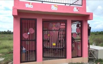 <p><strong>PINK ATTRACTION.</strong> A Hello Kitty-themed mausoleum is catching the eye of locals visiting their dead loved ones in a public cemetery in Tumauini, Isabela. A relative of the deceased girl decided to adopt the theme to honor her memory, according to the family's helper. <em>(PNA photo by Villamor Visaya Jr.)</em></p>
