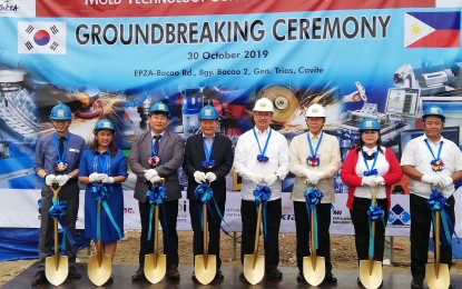 <p><strong>MOLD TECH SUPPORT CENTER. </strong>Department of Science and Technology (DOST) Secretary Fortunato de la Peña (4th from right), and then South Korean Ambassador Han Dong-man (3rd from right), during the groundbreaking ceremony of the Mold Technology Support Center (MTSC) at the Cavite Economic Zone in General Trias City, Cavite on Oct. 30, 2019. DOST-Metals Industry Research and Development Center (DOST-MIRDC) executive director Robert Dizon says molding and technology firms can use the facility once it operates in the middle of 2021. (<em>PNA file photo by Cristina Arayata</em>) </p>