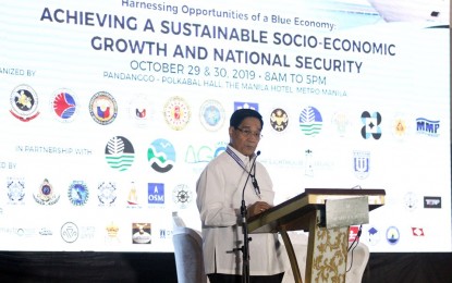 <p><strong>MARINE SUMMIT.</strong> National Security Adviser Hermogenes Esperon Jr. delivers a speech during the second and final day of the National Marine Summit 2019 at the Manila Hotel on Wednesday (Oct. 30, 2019). He revealed plan of the Duterte government to establish a national research academic fleet to achieve "robust and strengthened" marine scientific research in the country.<em> (PNA photo by Jess Escaros Jr.)</em></p>