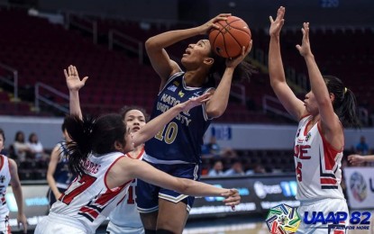 <p><strong>SWEEP</strong>. National University’s Jack Animam tries to squeeze her way through the UE defenders during the Lady Bulldogs’ 80-62 win against the Lady Warriors at the MOA Arena in Pasay City on Wednesday (Oct. 30, 2019). With their victory, NU swept the UAAP women’s basketball elimination. <em>(UAAP Media Bureau)</em></p>