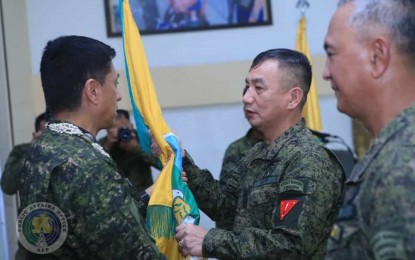 <p><strong>NEW CENTCOM CHIEF.</strong> AFP chief, Gen. Noel Clement (left) hands over the flag of the Central Command to newly-appointed commander, Maj. Gen. Roberto Ancan in a ceremony at Camp Lapu-Lapu, Cebu City on Thursday (Oct. 31, 2019). Prior to his new post, Ancan served as commander of the 1st Infantry Division (ID), 25th Infantry Battalion, 72nd Infantry Battalion, 66th Infantry Battalion and as a UN military observer in Timor Leste. <em>(Photo courtesy of AFP Public Affairs Office)</em></p>