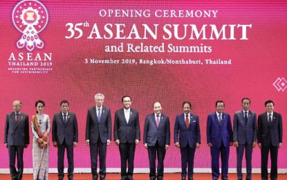 <p><strong>ASEAN FAMILY PHOTO. </strong> President Rodrigo Roa Duterte (3rd from left) poses for a family photo with other Association of Southeast Asian Nations (Asean) leaders during the opening ceremony of the 35th Asean Summit and Related Summits at the Impact Exhibition and Convention Center in Nonthaburi, Thailand on Sunday (Nov. 3, 2019).  During the plenary of the 35th Asean Summit last Saturday, Duterte said the Philippines will do its ‘utmost part’ to conclude negotiations on the South China Sea Code of Conduct. <em>(Presidential photo by Ace Morandante)</em></p>