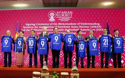 <p><strong>COMMEMORATIVE JERSEYS.</strong> President Rodrigo Roa Duterte joins other Association of Southeast Asian Nations (Asean) leaders as they receive commemorative jerseys after witnessing the signing ceremony of the memorandum of understanding between the Asean and the Fédération Internationale de Football Association (FIFA) at Impact Exhibition and Convention Center in Nonthaburi, Thailand Saturday (Nov. 2, 2019). The 10-member Asean bloc has expressed interest in a joint bid to host the FIFA World Cup in 2034. <em>(Presidential photo)</em></p>