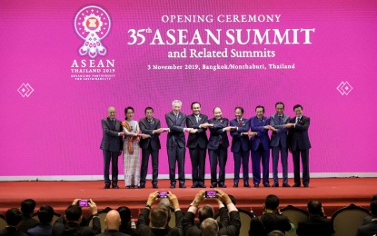 <p><strong>35TH ASEAN SUMMIT.</strong> President Rodrigo R. Duterte poses for a family photo with other leaders from the Association of Southeast Asian Nations (ASEAN) member countries during the opening ceremony of the 35th ASEAN Summit and Related Summits at the Impact Exhibition and Convention Center in Nonthaburi, Thailand on November 3, 2019. ASEAN leaders wanted to finish a binding Code of Conduct in the South China Sea within three years or earlier. <em>(Presidential Photo)</em></p>