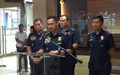 <p><strong>WHAT EVIDENCE PLANTING?</strong> PNP officer-in-charge, Lt. Gen. Archie Gamboa (in rostrum) says militant groups must prove in court that the firearms found in the raids in their offices in Bacolod City are planted, in a press briefing in Camp Crame on Monday (Nov. 4, 2019). Gamboa said the PNP has already established the link of these groups to the communist movement. <em>(PNA photo by Lloyd Caliwan)</em></p>