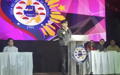 <p><strong>REGULAR PAY FOR VILLAGE EXECS.</strong> Presidential Assistant for the Visayas Michael Lloyd Dino delivers his message during the 2nd National Assembly of the Liga ng mga Barangay at the Waterfront Hotel in Cebu City on Monday (Nov. 4, 2019). Dino said the bill that seeks to give regular salaries and benefits to officials of 42,045 barangays in the country will empower them to perk up delivery of basic priority services down to the grassroots level. <em>(PNA photo by John Rey Saavedra)</em></p>