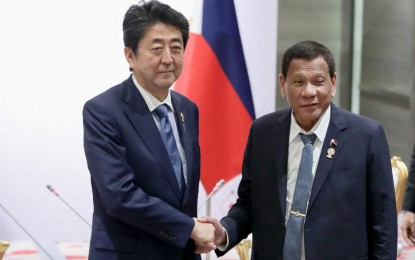 <p><strong>BEST WISHES.</strong> President Rodrigo Roa Duterte and Prime Minister of Japan Shinzo Abe pose for posterity prior to the start of their bilateral meeting at the Impact Exhibition and Convention Center in Nonthaburi, Thailand on November 4, 2019. Duterte conveyed his best wishes for Abe’s speedy and full recovery during their 25-minute phone conversation on Monday <em>(Sept. 7, 2020). (Presidential photo)</em></p>