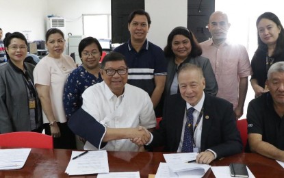 <p><strong>INSURED</strong>. Philippine Sports Commission (PSC) Chairman and Team Philippines Chef de Mission William Ramirez and Standard Insurance Group chairman Ernesto Echauz shake hands after signing a memorandum of agreement at the PSC administrative building in Manila on Tuesday (Nov. 5, 2019). Over 25,000 athletes, team officials, games workforce and volunteers of the 30th Southeast Asian Games will be covered by the insurance deal.<em> (Photo courtesy of PSC)</em></p>