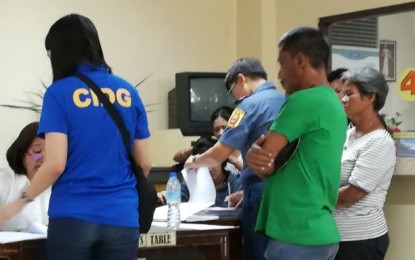 <p><strong>TRAFFICKING RAPS.</strong> Parents of three minors allegedly recruited to join the rebel movement filed charges against six suspected members of the Communist Party of the Philippines-New People’s Army for qualified trafficking before the Bacolod City Prosecutor's Office on Wednesday (Nov. 6, 2019). The complainants were assisted by personnel of the Philippine National Police-Criminal Detection and Investigation Group-Western Visayas and Bacolod City Police Office-Women and Children Protection Desk. <em>(PNA photo by Nanette L. Guadalquiver)</em></p>