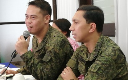<p><strong>ABIDING BY THE RULE OF LAW.</strong> Brig. Gen. Benedict Arevalo (right), commander of the 303rd Infantry Brigade, and Capt. Cenon Pancito III, public affairs chief of the 3rd Infantry Division, say in a press conference on Thursday afternoon (Nov. 7, 2019) that the Philippine Army adheres to the rulings of the Office of the City Prosecutor on the persons arrested during raids in Bacolod City on October 31. They said the dismissal of the complaints against 31 of 42 persons charged did not weaken the cases filed by the police’s Criminal Investigation and Detection Group. <em>(PNA photo by Nanette L. Guadalquiver)</em></p>