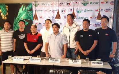 <p><strong>SEAG TEST EVENT</strong>. Officials and players of the upcoming Smart National Open Badminton Tournament pose for a photo op during the press launch at Hey Brew Bar and Restaurant in San Juan City on Thursday (Nov. 7, 2019). The tournament, slated from Nov. 17 to 22, will serve as test event for the SEA Games-bound players. <em>(PNA photo by Ivan Steward Saldajeno)</em></p>