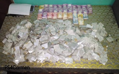 <p><strong>RECOVERED.</strong> The money recovered by the police from suspect John Paul Cruz, former manager of a pawnshop, who allegedly broke into his former workplace and stole money and jewelry on Sunday (Nov. 10, 2019). <em>(Photo courtesy of Cagayan de Oro City police)</em></p>