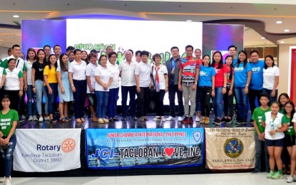 <p><strong>GIVING BACK</strong>. Members of civic organizations in Tacloban and An Waray Party-list are shown during the launching of “Balik-Bulig” (giving back) drive at Robinsons North Tacloban on Nov. 8, 2019. The generous amount received from different parts of the country and the world has prompted the groups to gather more donations for the quake victims in Mindanao. <em>(Photo courtesy of An Waray Party-list)</em></p>