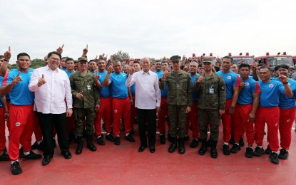 <p><strong>READY FOR 30TH SEA GAMES.</strong> Defense Secretary Delfin Lorenzana (center) leads the send-off ceremony for the soldier-athletes, coaches, and emergency responders who will participate in the 30th Southeast Asian Games, in Camp Aguinaldo on Monday (Nov. 11, 2019). The country will host the regional biennial sporting event from November 30 to December 11. <em>(PNA photo by Joey O. Razon)</em></p>