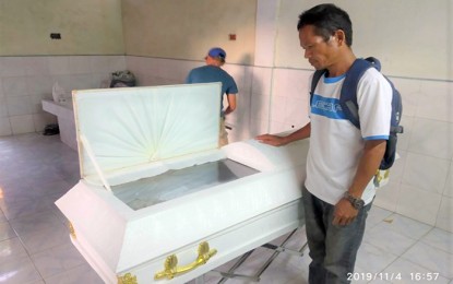 <p><strong>TRAGIC REUNION.</strong> The father of 'Joey', the young NPA rebel killed during an encounter in Santiago, Agusan del Norte, on November 2 claims the dead body of his son. Reginaldo T. Mira of Guigaquit, Surigao del Norte, said the last time he saw his son was on October 2, 2017, the day he decided to join the NPA at the young age of 17. <em>(Photo courtesy of 29IB)</em></p>