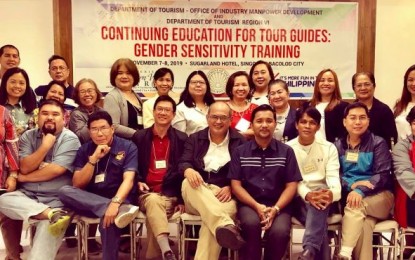 <p><strong>GENDER SENSITIVE TOURISM.</strong> Participants of the gender sensitivity seminar for Department of Tourism-trained and accredited tour guides in Negros Occidental with the resource speaker and provincial tourism executives after the training held in Bacolod City on Nov. 7 and 8. The provincial government is advocating a more gender-responsive policy and practices for progressive tourism industry. <em>(Photo courtesy of Negros Occidental Tourism Division)</em></p>