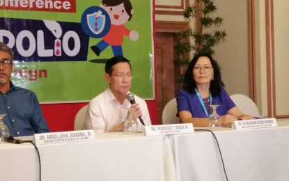 <p><strong>POLIO VACCINATION SUPPORT.</strong> Department of Health Secretary Francisco Duque III (center) urges the governors and local chief executives in Mindanao to participate in the second round of the "Sabayang Patak Kontra Polio" on Nov. 25 to Dec. 6, 2019. Duque said local officials should also organize their own localized polio campaign. <em>(PNA photo by Che Palicte)</em></p>