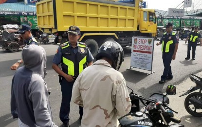 <p><strong>OPLAN SITA</strong>. Lt. Col. Franklin Ortiz (second from left), officer-in-charge of Malasiqui Police Station, leads the checkpoint on Wednesday (Nov. 13, 2019) at the central business district of the town. Pangasinan provincial director Redrico Maranan directed the police chiefs to personally lead the checkpoints or Oplan Sita in every town and city of Pangasinan. <em>(Photo courtesy of Malasiqui Police Station)</em></p>