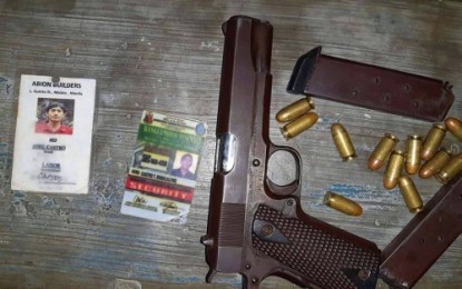 <p><strong>SEIZED.</strong> The unlicensed .45-caliber pistol and bullets seized at a checkpoint of the Army’s 90th Infantry Battalion from two motorcycle-riding suspects in Talitay, Maguindanao on Wednesday (Nov. 13, 2019). The arrest of the suspects came amid the continuing implementation of martial law in Mindanao due to threats of terrorism. <em>(Photo courtesy of 90IB)</em></p>