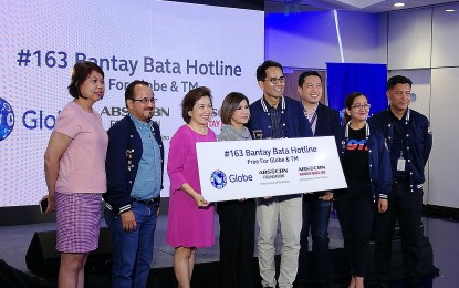 <p><strong>PARTNERS VS. CHILD ABUSE.</strong> Globe chief commercial officer Albert de Larrazabal (2nd from left), ABS-CBN Foundation managing director Susan Afan, and other executives announce their partnership to save more kids, held at the BGC, Taguig City last Nov. 7, 2019. Globe subscribers can call ABS-CBN Foundation's Bantay-Bata 163 hotline for free starting Monday (Nov. 18, 2019).<em> (PNA photo by Cristina Arayata)</em></p>