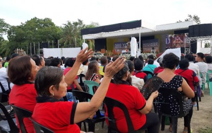 <p><strong>FIRST MASS COUNTDOWN.</strong> Pilgrims react during the Pontifical Mass and opening salvo on the symbolic first day of the countdown of the 500th anniversary of the First Roman Catholic Mass at the Sunken Garden, provincial capitol grounds in Maasin City, Southern Leyte on Sunday. Limasawa Island, the smallest town in the province of Southern Leyte is the site of the First Catholic Mass in Asia, officiated on Easter Sunday, March 31, 1521, by Father Pedro de Valderrama under the fleet of Ferdinand Magellan. <em>(PNA photo by Gerico Sabalza)</em></p>