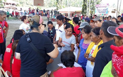 <p><strong>SERVICE CARAVAN.</strong> Residents of Barangays Quiapo, San Isidro, Kalbay, and Molmol in Jose Abad Santos town, Davao Occidental, benefit from a convergence of government services, on Monday (November 18, 2019). Various services were delivered by the member-agencies of the Davao Occidental Provincial Task Force to End Local Communist Armed Conflict.<em> (Photo courtesy of PIA-11)</em></p>