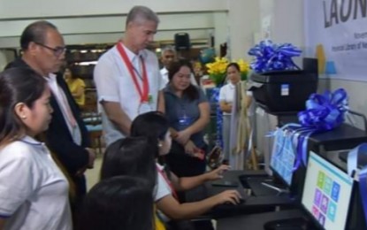 <p><strong>E-LEARNING CENTER.</strong> The provincial library of Negros Occidental has opened a Tech4ED Center, in partnership with the Department of Information and Communications Technology, to cater to Negrenses who have minimal or no access to information and government services. Governor Eugenio Jose Lacson (standing, 2nd from right) leads the launching, with (from left) Provincial Librarian Rio Lynne Panisa, DICT-Negros Occidental head Romeo Tome, and Provincial Board Secretary Maki Angel Ascalon on Monday (Nov. 18, 2019). <em>(Photo courtesy of PIO Negros Occidental)</em></p>