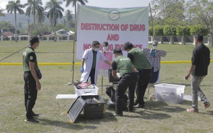<p><strong>ILLEGAL DRUGS BURNED.</strong> Personnel from Philippine Drug Enforcement Agency Region 11 prepares the area where the PHP24.8 million worth of confiscated illegal drugs in Davao Region will be burned at the capitol grounds in Nabunturan, Compostela Valley province on Monday (Nov. 18). The burning of the seized illegal drugs is mandated by law. <em>(Photo courtesy of PDEA-11)</em></p>