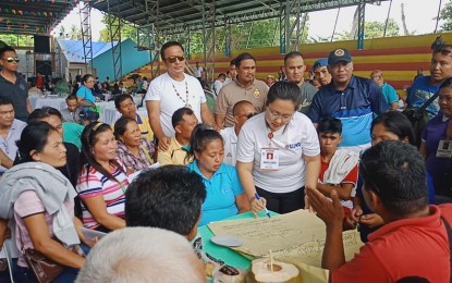 <p><strong>'DAGYAWAN'</strong>. Negros Oriental Gov. Roel Degamo (standing, in white t-shirt) observes discussions during a recent Dagyawan sa Barangay meeting in Guihulngan City, Negros Oriental, of the Negros Oriental Task Force to End Local Communist Armed Conflict (NOTF-ELCAC). President Rodrigo Duterte is expected to attend on Nov. 28 in Dumaguete City the formal turnover of consolidated reports on priority projects and issues raised during the series of "Dagyawan" in six insurgency-affected areas in the province. <em>(File photo by Juancho Gallarde)</em></p>