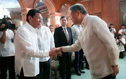 <p>President Rodrigo Duterte shakes hands with Ambassador of the Republic of Korea Han Dong-man who paid a courtesy call on the President at the Malacañan Palace on November 18, 2019. Han said the growing popularity of Korean pop, drama, food, and other products in the Philippines may soon give rise to a Korea Town in Malate, Manila.<em> (Presidential Photo)</em></p>