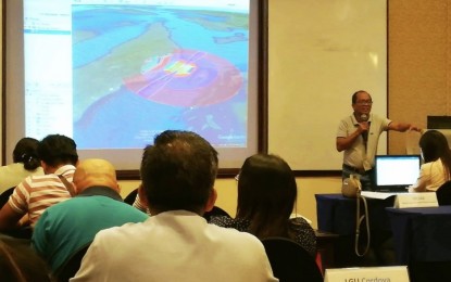 <p><strong>AIR TRAFFIC OBSTRUCTION.</strong> Engr. Francisco Alconera of the Civil Aviation Authority of the Philippines explains to local government officials and representatives of business establishments near the Mactan Cebu International Airport (MCIA) about the Obstruction Limitation Surface policy during an awareness seminar on Monday (Nov. 18, 2019). Alconera reminded owners of establishments to ensure their buildings' height is within the limit to prevent obstruction to air traffic.<em> (PNA photo by Fe Marie Dumaboc)</em></p>
