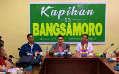 <p><strong>SPORTS FOR PEACE.</strong> Officials of the Philippine Sports Commission led by PSC Commissioner Charles Raymond Maxey (right) and Bangsamoro Sports Commission chairman Norhan Uka (left) flanks Minister Naguib Sinarimbo of the Ministry of the Interior and Local Government–Bangsamoro Autonomous Region in Muslim Mindanao (MILG-BARMM) during the launching in the BARMM of the Mindanao Sports for Peace Caravan on Tuesday (Nov. 21, 2019). The PSC intends to bring the sports caravan to various parts of Mindanao to spread peace and goodwill.<em> (Photo by PNA Cotabato)</em></p>