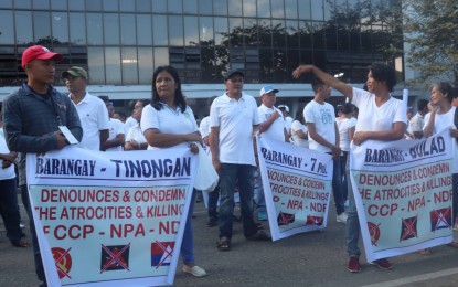 <p><strong>CONDEMNATION.</strong> Residents of Isabela, Negros Occidental join the walk for peace to denounce the atrocities and reject the presence of the Communist Party of the Philippines - New People’s Army (CPP-NPA) in their municipality on Tuesday (Nov. 19, 2019). Mayor Irene Montilla and Vice Mayor Renato Malabor Jr. led the ceremonial signing of the resolution declaring the terrorist group persona non grata in the central Negros municipality. <em>(Photo courtesy of 62nd Infantry Battalion, Philippine Army)</em></p>
