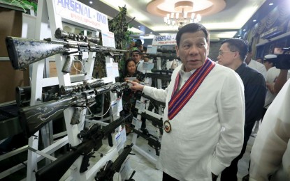 <p><strong>AFP MODERNIZATION.</strong>  President Rodrigo Roa Duterte inspects some of the armaments exhibited during the 80th anniversary of the Department of National Defense (DND) at Camp General Emilio Aguinaldo in Quezon City on November 20, 2019.  Duterte vowed to sustain the modernization of the Armed Forces of the Philippines. <em>(Presidential photo of Alfred Frias)</em></p>