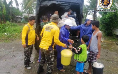 <p><strong>AID TO 'RAMON' VICTIMS.</strong> Naval Forces Northern Luzon troops distribute relief goods to victims of typhoon Ramon in Santa Ana, Cagayan on Wednesday (Nov. 20, 2019). The Navy continues to monitor the situation to include nearby provinces such as Isabela, Batanes, and Ilocos region for possible deployment and search and rescue operations. <em>(Photo courtesy of Naval Public Affairs Office)</em></p>