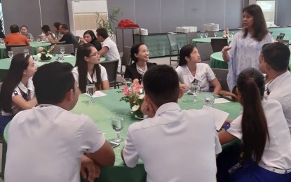 <p><strong>FIGHT VS. FAKE NEWS</strong>. Presidential Communications Operations Office (PCOO) Undersecretary Lorraine Marie T. Badoy (right, standing) interacts with students from different colleges and universities in Bohol on the sidelines of the Asean Awareness Forum held at Bellevue Pavilion in Panglao Island, Bohol Friday (Nov. 22, 2019). Badoy said information ministers attending the Asean Senior Officials Meeting Responsible for Information (SOMRI) on Nov. 19 to 22, 2019 successfully tackled regional cooperation and member states' initiatives in combating fake news. <em>(PNA photo by John Rey Saavedra)</em></p>