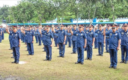 <p><strong>PROMOTION.</strong> Some 1,147 Philippine National Police personnel in Western Visayas advanced to higher ranks. The newly promoted police officers received their new ranks in an oath-taking ceremony and pinning of rank insignias at the Police Regional Office 6 headquarters in Camp Martin Delgado on Monday (Nov. 25, 2019). <em>(Photo courtesy of PRO 6 PIO)</em></p>