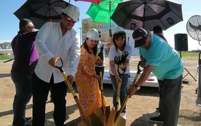 <p><strong>WORLD-CLASS THEME PARK.</strong> Pampanga Governor Dennis Pineda, his siblings, 2nd District Board Member Mylyn Pineda-Cayabyab and Rosselle Pineda, and their father, businessman Rodolfo "Bong" Pineda (left to right), lead the groundbreaking ceremony for the Pradera Islands Amusement Park in Lubao, Pampanga on Monday (Nov. 25, 2019). The world-class theme park will rise on a 23-hectare site. <em>(Photo by Marna Dagumboy-Del Rosario)</em></p>
