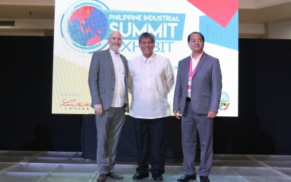 <p>(From left) Advanced Energy Technologies Chairman Samuel West Stewart; Franklin Quijano, CEO/Administrator, PHIVIDEC Industrial Authority; and CICSI Technology Solutions Consultant Manny S.D. Lopez at the Philippine Industrial Summit Exhibit at Limketkai Mall Rotunda, Cagayan de Oro City on Monday (November 25, 2019). <em>(PNA photo by Jess M. Escaros Jr.)</em></p>