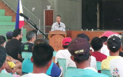<p><strong>‘PAGSISIKAP 2019’.</strong> Philippine Navy Naval Forces Northern Luzon (NFNL) commander, Commodore Caesar Bernard Valencia speaks before the fishermen attending the forum on Tuesday (Nov. 26, 2019) at San Fabian, Pangasinan. NFNL conducted a community relations services in San Fabian town as part of the exercise. <em>(Photo by Hilda Austria)</em></p>