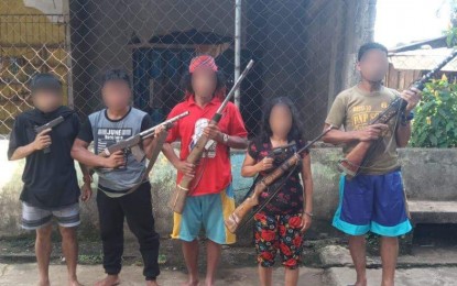 <p><strong>MORE SURRENDERERS.</strong> Along with their firearms, five more persons who claimed to be active combatants of the communist New People’s Army surrendered on Monday (Nov. 25, 2019) to the Army's 8th Infantry Battalion based in Bukidnon. (<em>Photo courtesy of Army's 8th IB)</em></p>