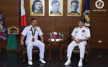 <p><strong>VISIT TO PN HEADQUARTERS. </strong>Rear Admiral Chonlathis Navanugraha (left), Deputy Director General of the Naval Intelligence Department of the Royal Thai Navy (RTN) shares a light moment with Naval Sea Systems head, Rear Admiral Rommel Jason L. Galang (right) of the Philippine Navy (PN) during the RTN delegation's visit to the PN on Tuesday (Nov. 26, 2019). The activity signifies the sustainment of the already strong friendship between the Philippines and Thailand which also benefits both armed forces.<em> (Photo courtesy of Naval Public Affairs Office)</em></p>